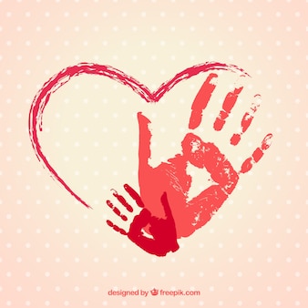 Corazón pintado a mano con huellas de manos Corazón pintado a mano con huellas de manos