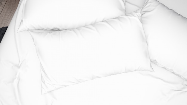 Biała poduszka na łóżku, zbliżenie