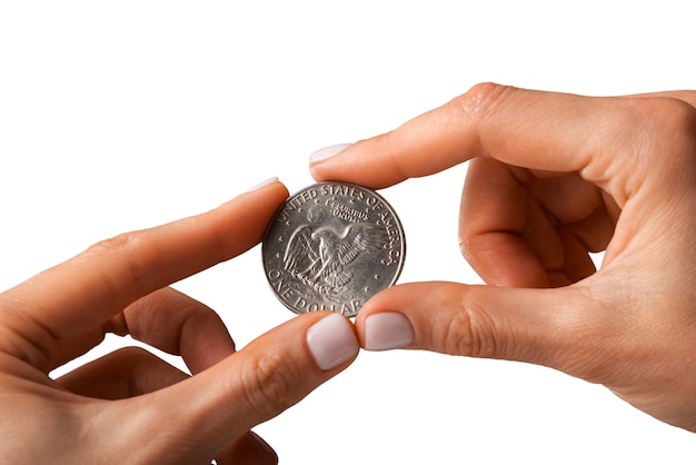Bezpłatny plik PSD zbliżenie na monetę w ręku, odizolowaną