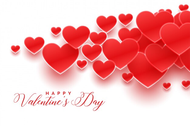 Atrakcyjni czerwoni valentine serca na białym kartka z pozdrowieniami