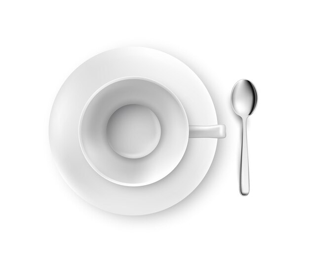 Biały talerz kubek łyżka stół sztućce zestaw płasko leżał Puste naczynie na śniadanie lub herbatę czyste naczynia do jadalni na białym tle