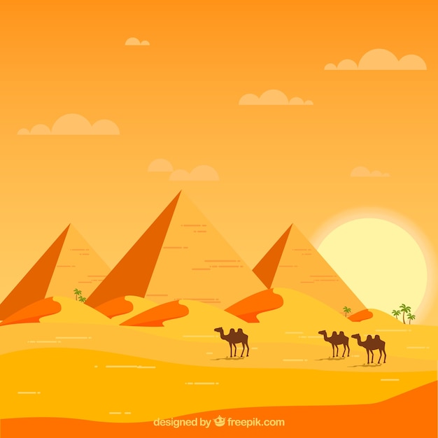 Egipt krajobraz z karawaną i piramidami