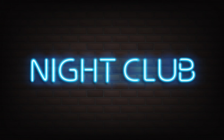 Bezpłatny plik Wektor klub nocny neon napis na tle ciemnego muru.