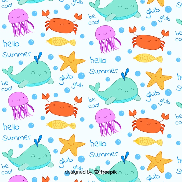 Bezpłatny wektor kolorowe doodle zwierzęta morskie i słowa wzór