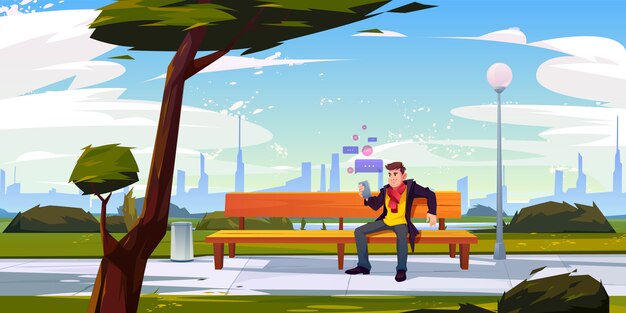 Mężczyzna z smartphone obsiadaniem na ławce w miasto parku