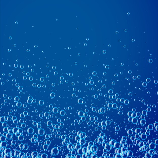 Niebieskie tło z wielu wody lub baniek mydlanych