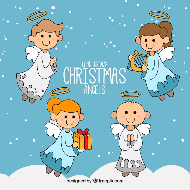 Bezpłatny wektor paczka ręcznie rysowane świąteczne anioły