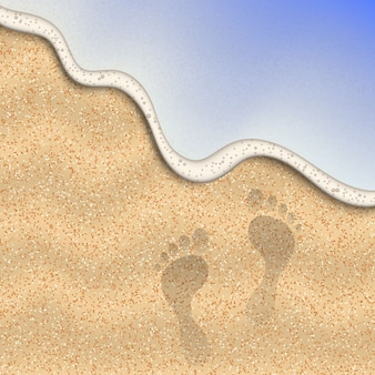 Piasek na plaży ze śladem stóp