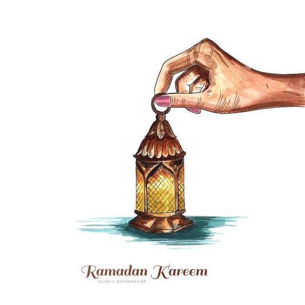 Piękna ręka trzyma arabską lampę ramadan kareem w tle