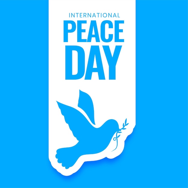 Bezpłatny wektor plakat światowego dnia pokoju w stylu wycinanki papierowej z ptakiem gołębiem i wektorem liścia oliwnego