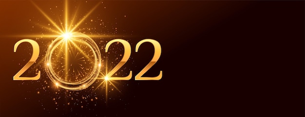 Bezpłatny wektor szczęśliwego nowego roku 2022 złoty tekst z błyszczącymi błyskami i efektem świetlnym