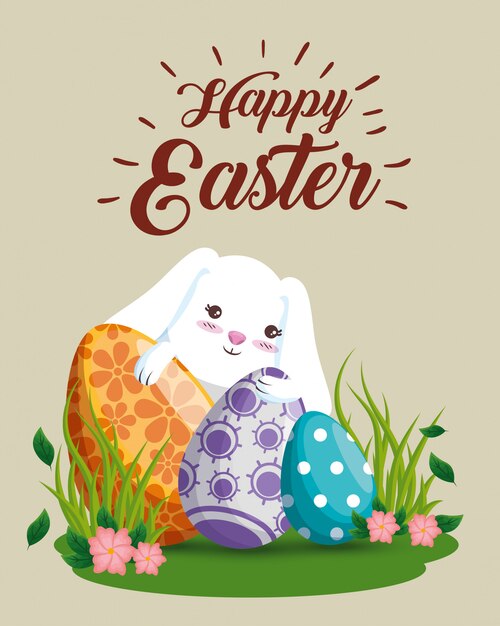 Szczęśliwy królik z jajkami dekoracyjnymi i kwiatami