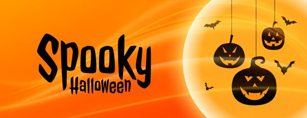 Upiorny transparent halloween z wiszącymi kształtami dyni