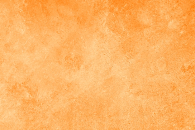 Abstrakcjonistyczna jasnopomarańczowa lub żółta ścienna tekstura