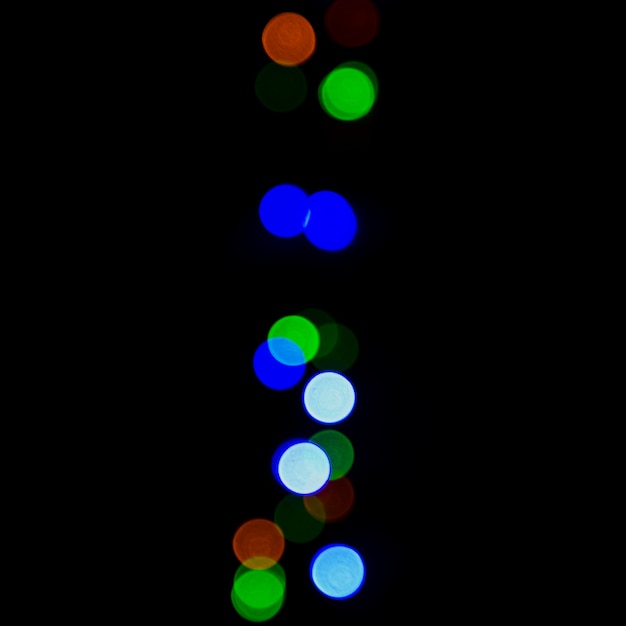Bezpłatne zdjęcie abstrakcjonistyczny bokeh tło z kolorowymi światłami