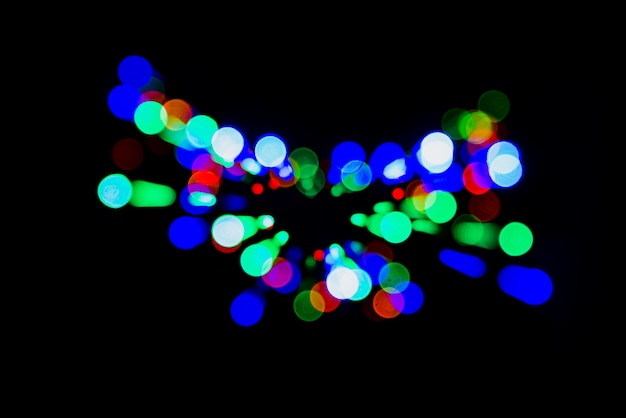 Bezpłatne zdjęcie abstrakcjonistyczny bokeh tło z kolorowymi światłami