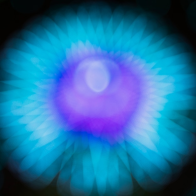 Bezpłatne zdjęcie abstrakcjonistyczny gradient zamazywał błękitnego ruchu neonowych światła cudu koło