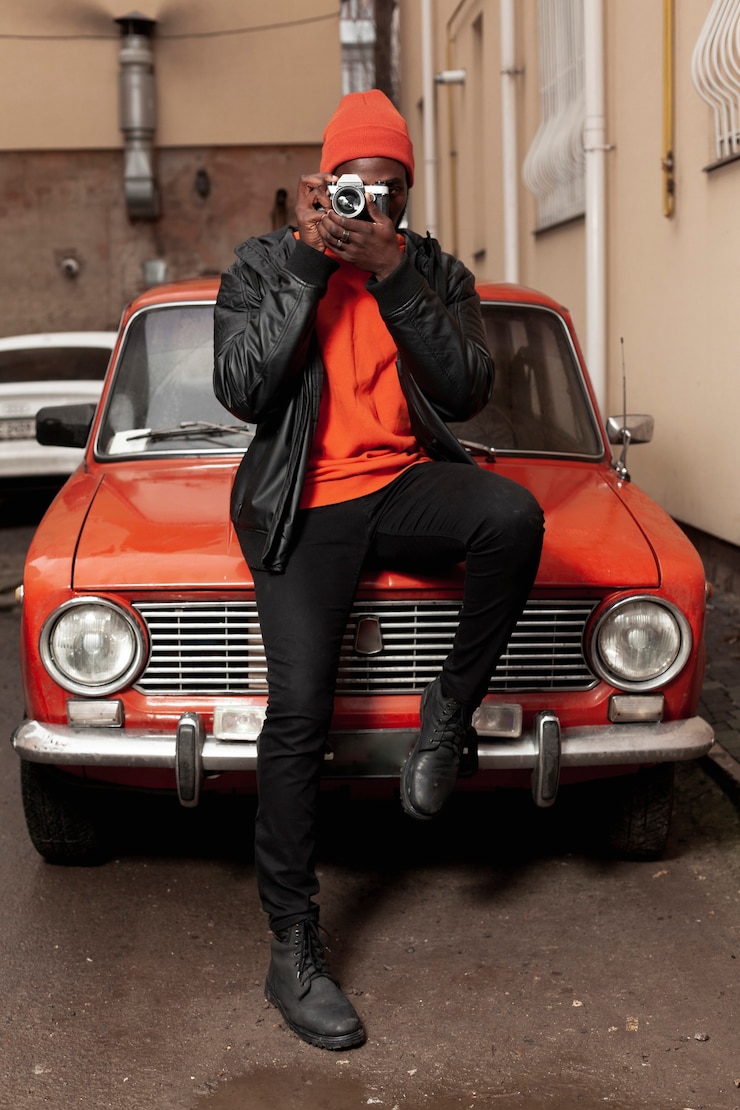Bezpłatny plik Zdjęcie afroamerican mężczyzna bierze fotografia folującego strzał