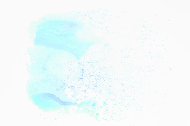Akwarela niebieski rozchlapać tekstura na białym tle
