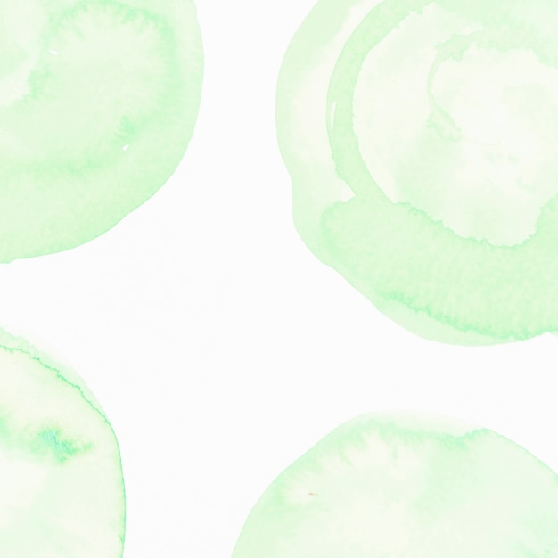 Bezpłatne zdjęcie akwarela zielony okrąg tekstura na białym tle