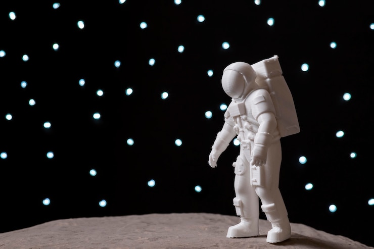 Bezpłatny plik Zdjęcie aranżacja martwej natury z astronautą