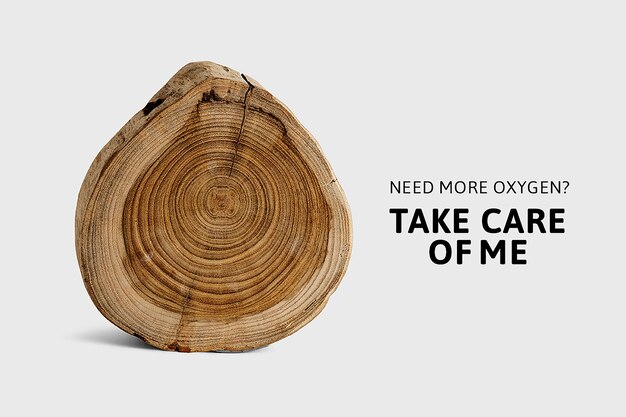 Baner świadomości ekologicznej wylesiania z posiekanym kawałkiem drewna