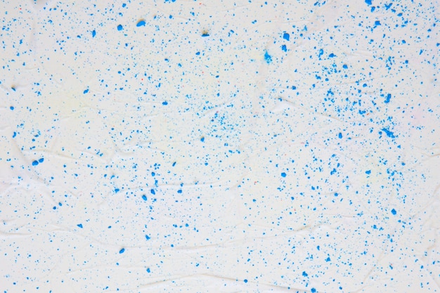 Barwiona papierowa tekstura z błękitnymi kropkami