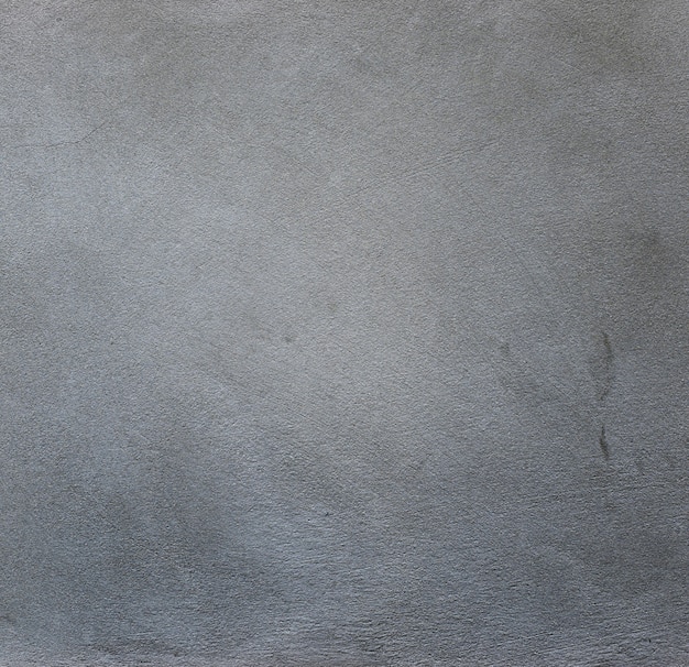 Betonowa ściana Porysowany Materialny tło tekstury pojęcie