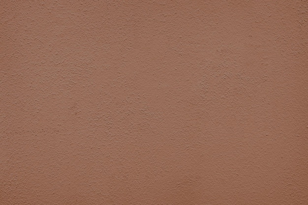 Beżowe tło tekstury ściany z kroplami farby