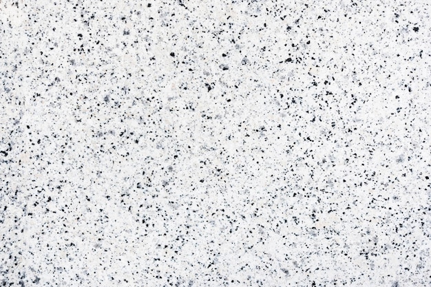 Biała granitowa tekstura na tle