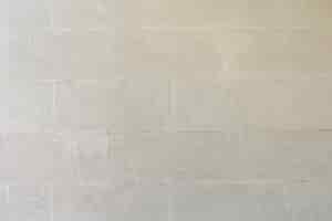 Bezpłatne zdjęcie białej cegły ściany tło