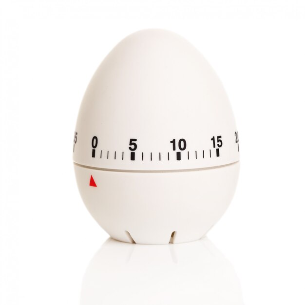 Biały zegar w kształcie jajka