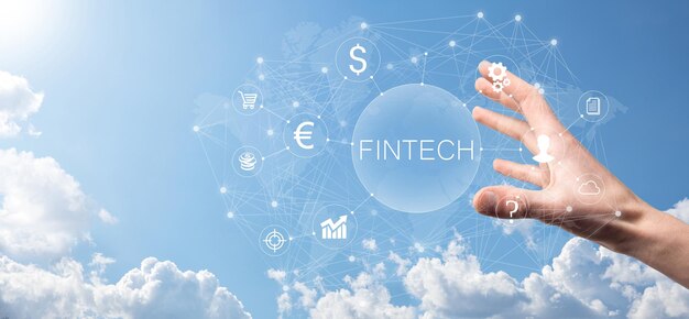 Biznesmen przytrzymaj fintech-koncepcja technologii finansowej. płatności bankowości inwestycyjnej biznesu. inwestycje w kryptowaluty i pieniądze cyfrowe. koncepcja biznesowa na wirtualnym ekranie.
