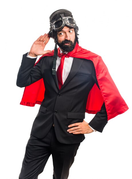 Biznesmen Super hero słuchania coś