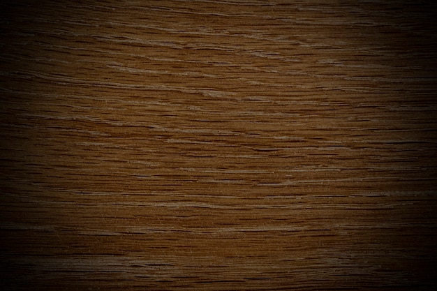 Brązowe gładkie drewniane teksturowane tło
