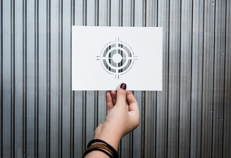 Bezpłatny plik Zdjęcie cel aspiracji perforowanego papieru bullseye