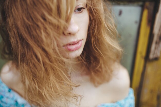 Close-up of red-haired teen