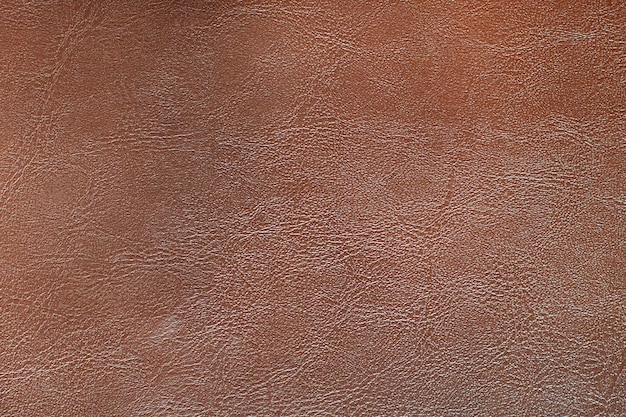 Czerwonawo-brązowe skórzane teksturowane tło