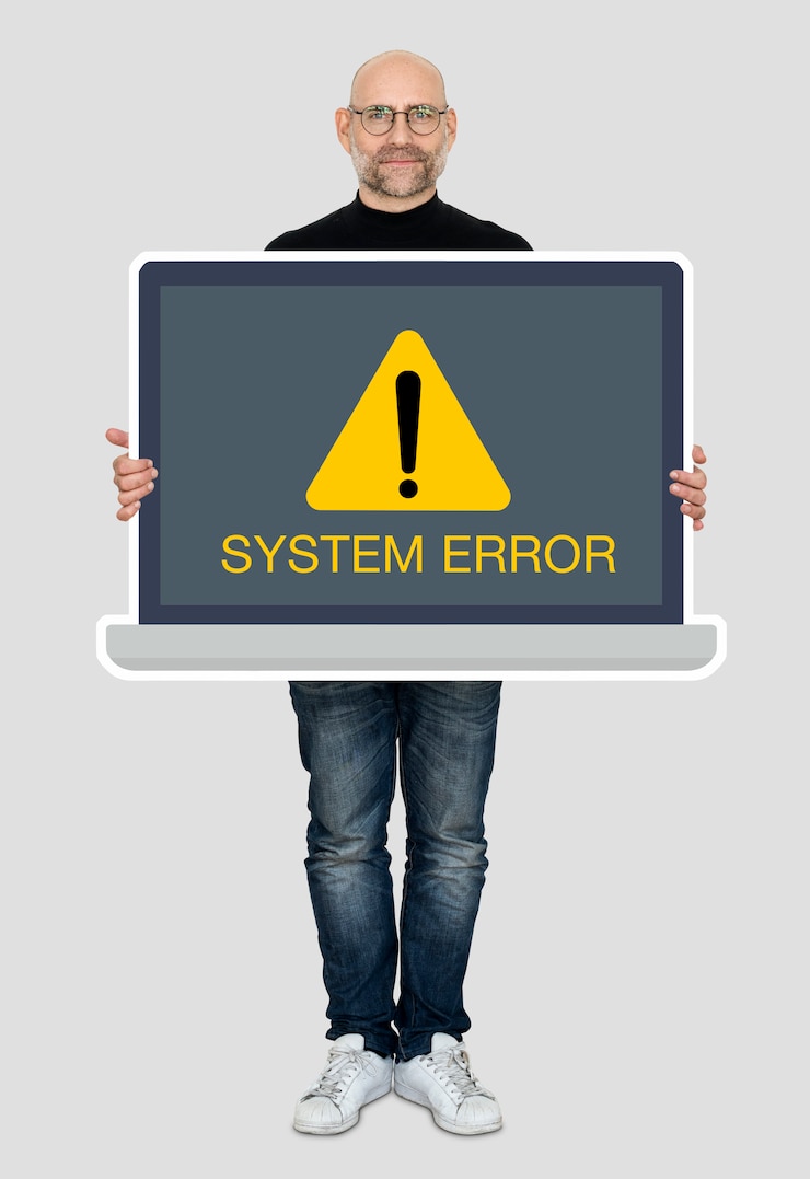 Bezpłatny plik Zdjęcie człowiek posiadający laptopa z błędem systemu