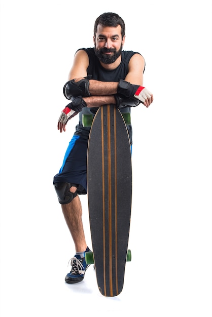 Bezpłatne zdjęcie człowiek skater z longboard