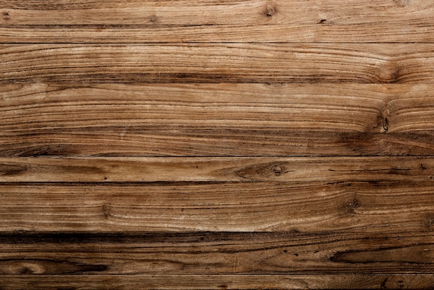 Drewniana deska z teksturą tle materiału