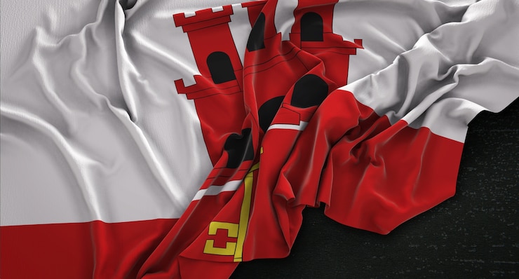 Bezpłatny plik Zdjęcie flaga gibraltaru zmarszczki na ciemnym tle renderowania 3d