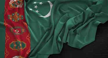 Bezpłatne zdjęcie flaga turkmenistanu zgnieciony na ciemnym tle renderowania 3d