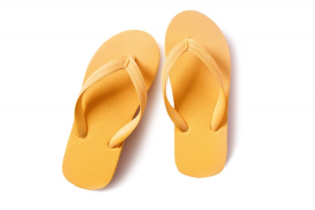 Flipflops żółta para odizolowywająca na białym tle