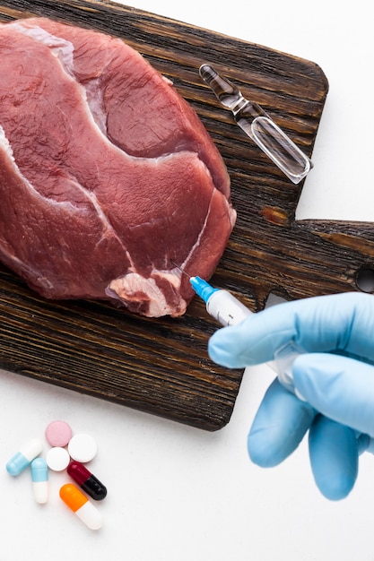 Bezpłatne zdjęcie gmo chemiczne modyfikowane mięso żywności wysoki widok