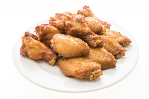Grillowany BBQ chicken wing w białym talerzu