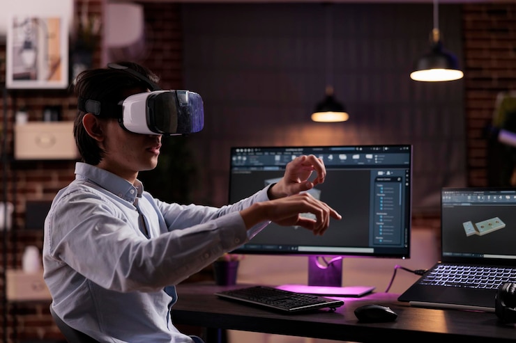 Bezpłatny plik Zdjęcie inżynier przemysłowy produkt maszynowy, pracujący z okularami vr i oprogramowaniem cad na monitorze. opracowanie komponentu silnika z goglami wirtualnej rzeczywistości dla produkcji przemysłowej.