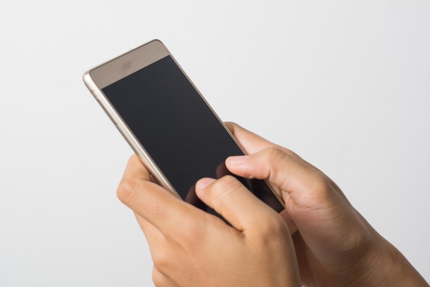 Kobieta Dłoń trzymająca inteligentny telefon pusty ekran. Skopiuj miejsce. Dłoń trzymająca smartphone na białym tle.