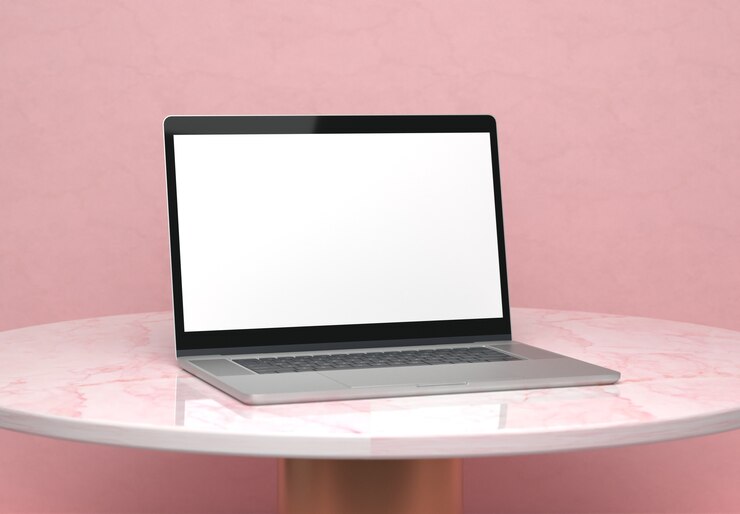 Bezpłatny plik Zdjęcie laptop na marmurowym stole