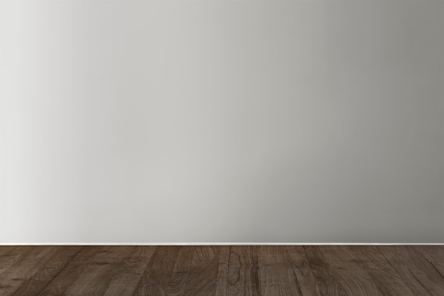 Bezpłatne zdjęcie makieta szara pusta betonowa ściana z drewnianą podłogą